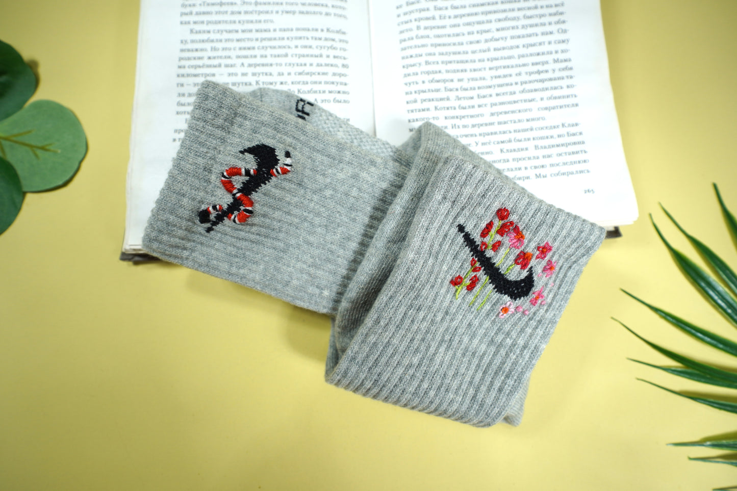 Socks embroidered with snakes and colorful flowers