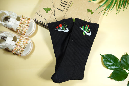 Hand-embroidered socks with cactus and mushrooms