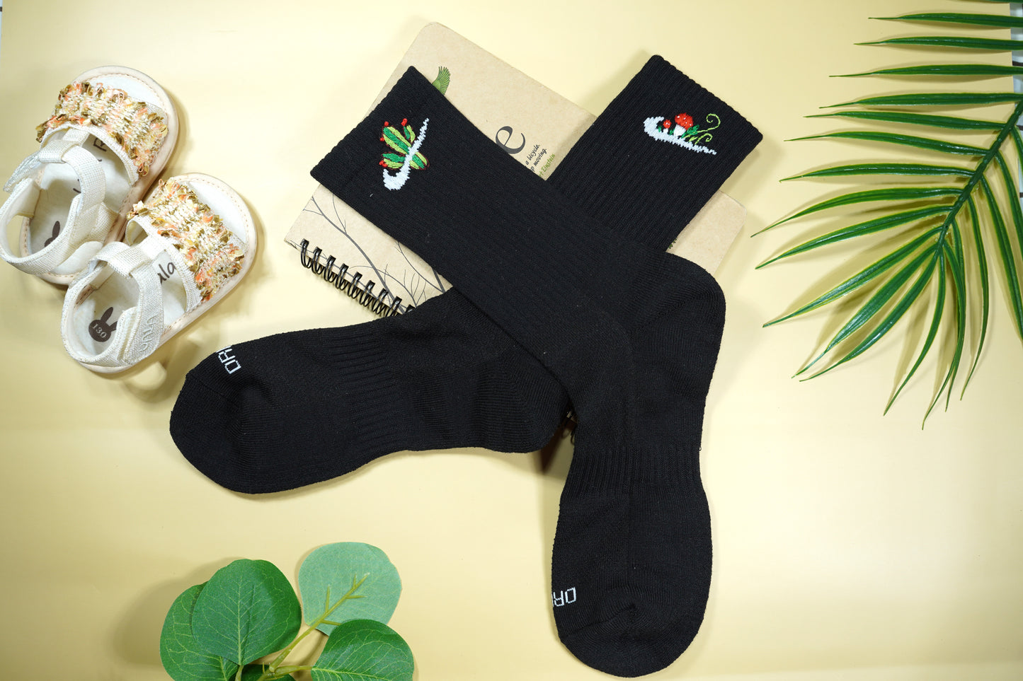 Hand-embroidered socks with cactus and mushrooms