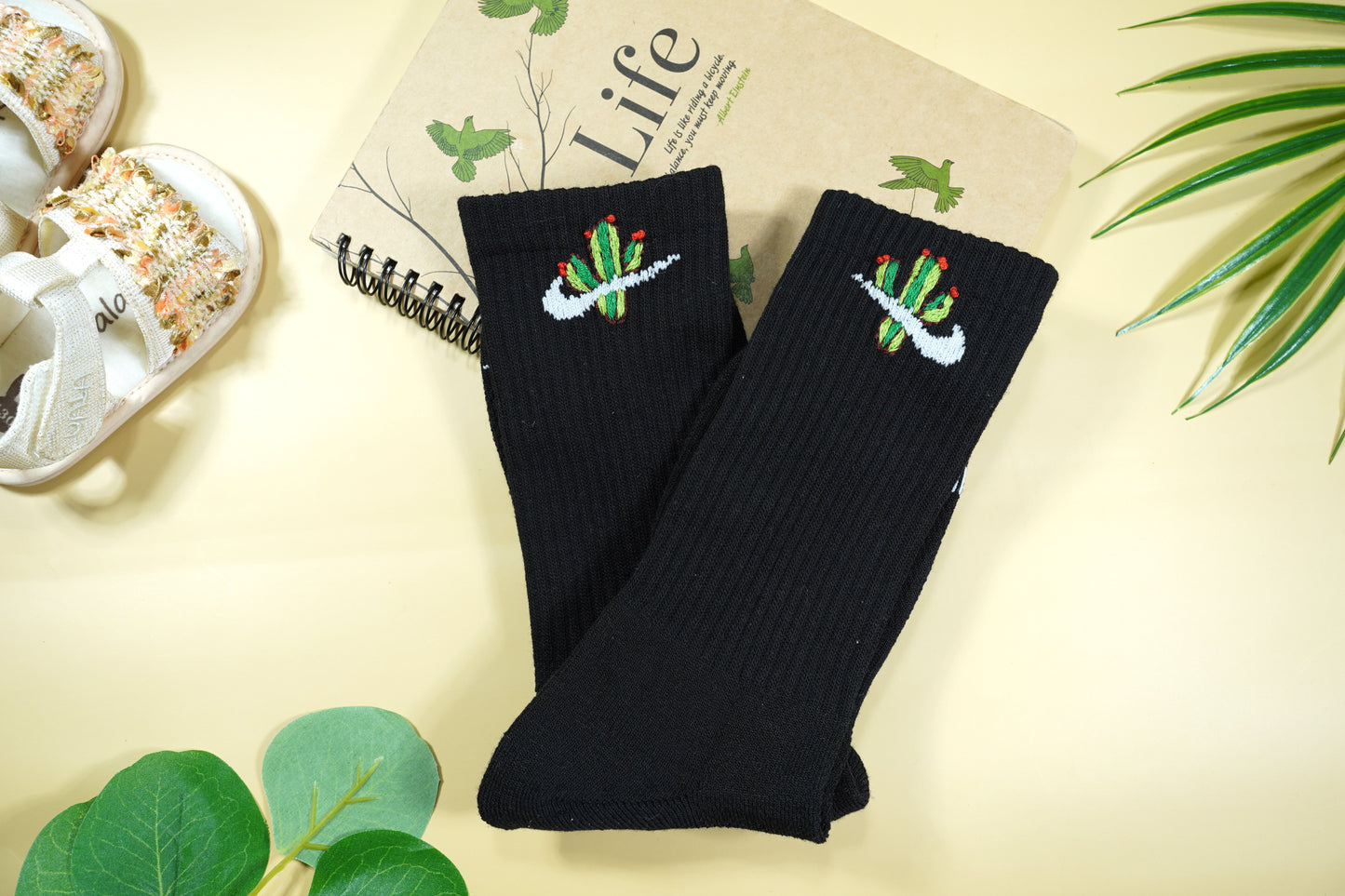 Hand-embroidered socks with cactus and mushrooms