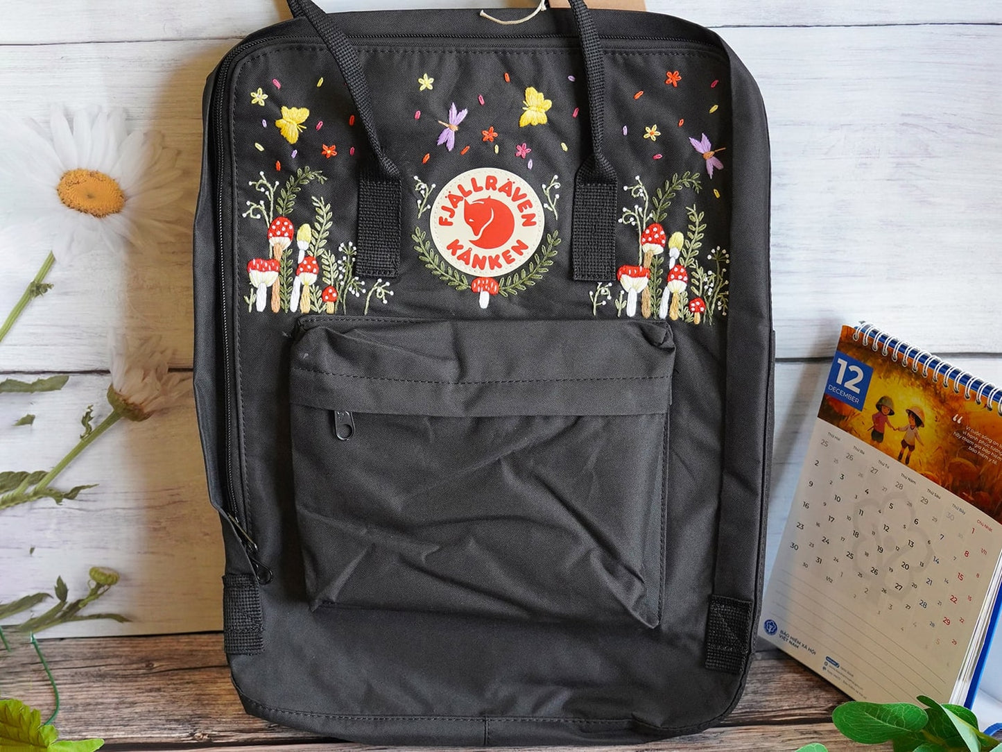 Fjallraven kanken backpack embroidered with mushrooms and butterflies