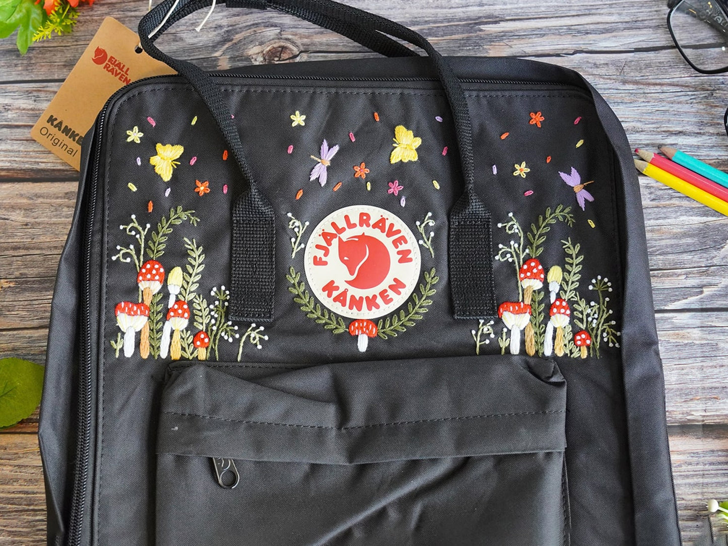 Fjallraven kanken backpack embroidered with mushrooms and butterflies