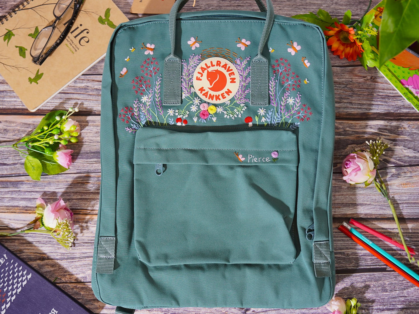 Fjallraven kanken bag with lavender and butterfly embroidery/Lavender and butterfly embroidery design on fjallraven kanken backpack