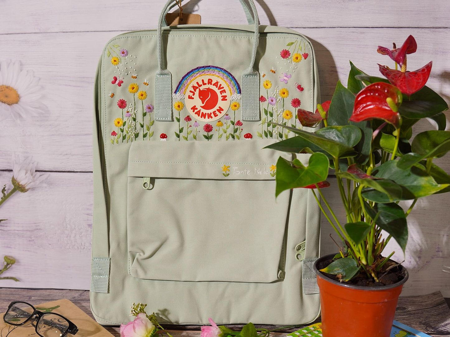 Fjallraven Kanken backpack embroidery design with flower and rainbow embroidery