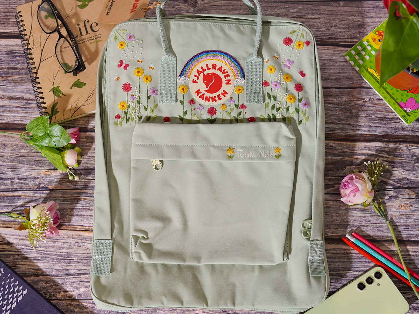 Fjallraven Kanken backpack embroidery design with flower and rainbow embroidery