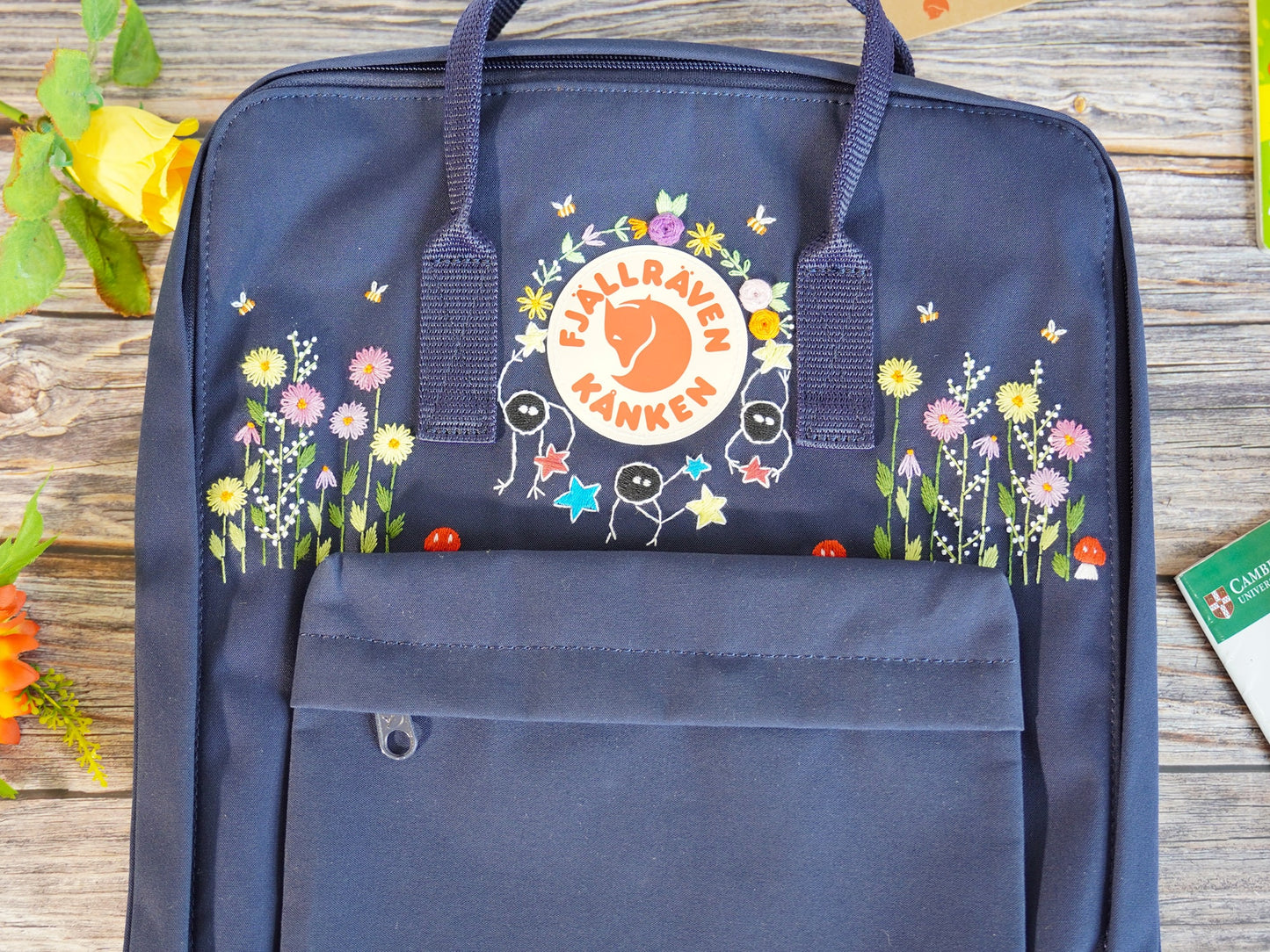 Fjallraven Kanken backpack with colorful floral embroidery