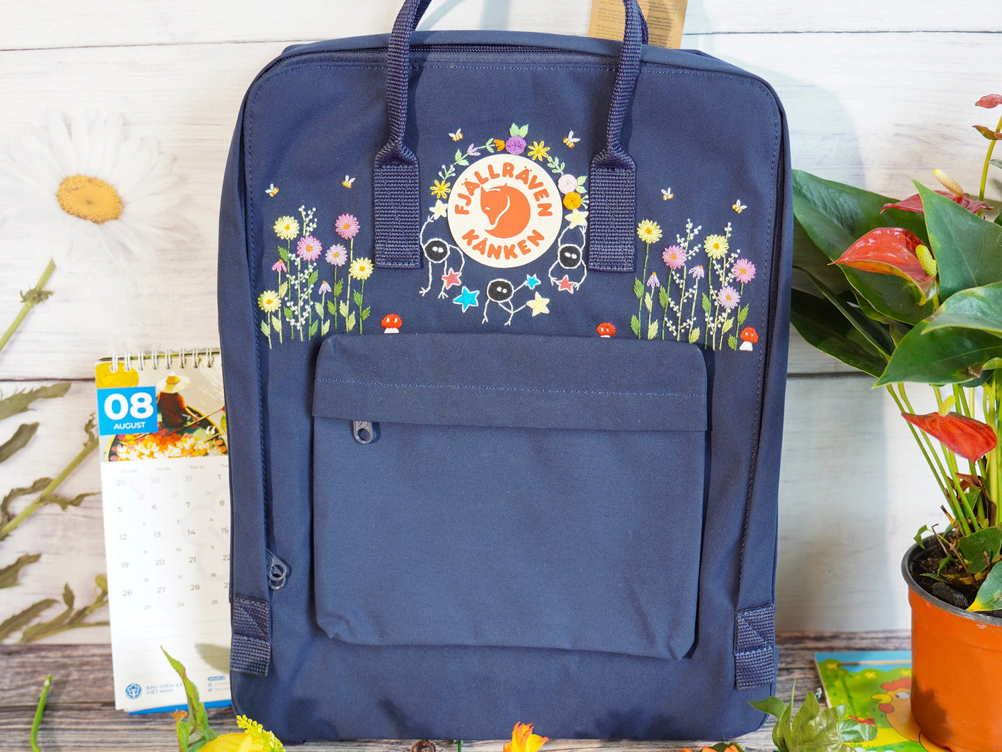 Fjallraven Kanken backpack with colorful floral embroidery