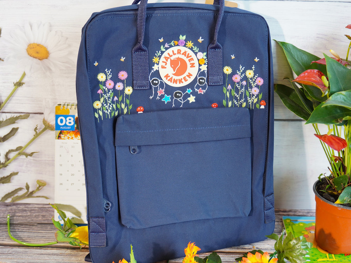 Fjallraven Kanken backpack with colorful floral embroidery