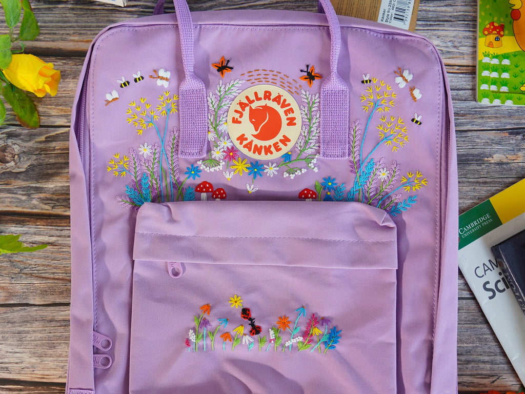  Floral and butterfly embroidery design on fjallraven kanken backpack 