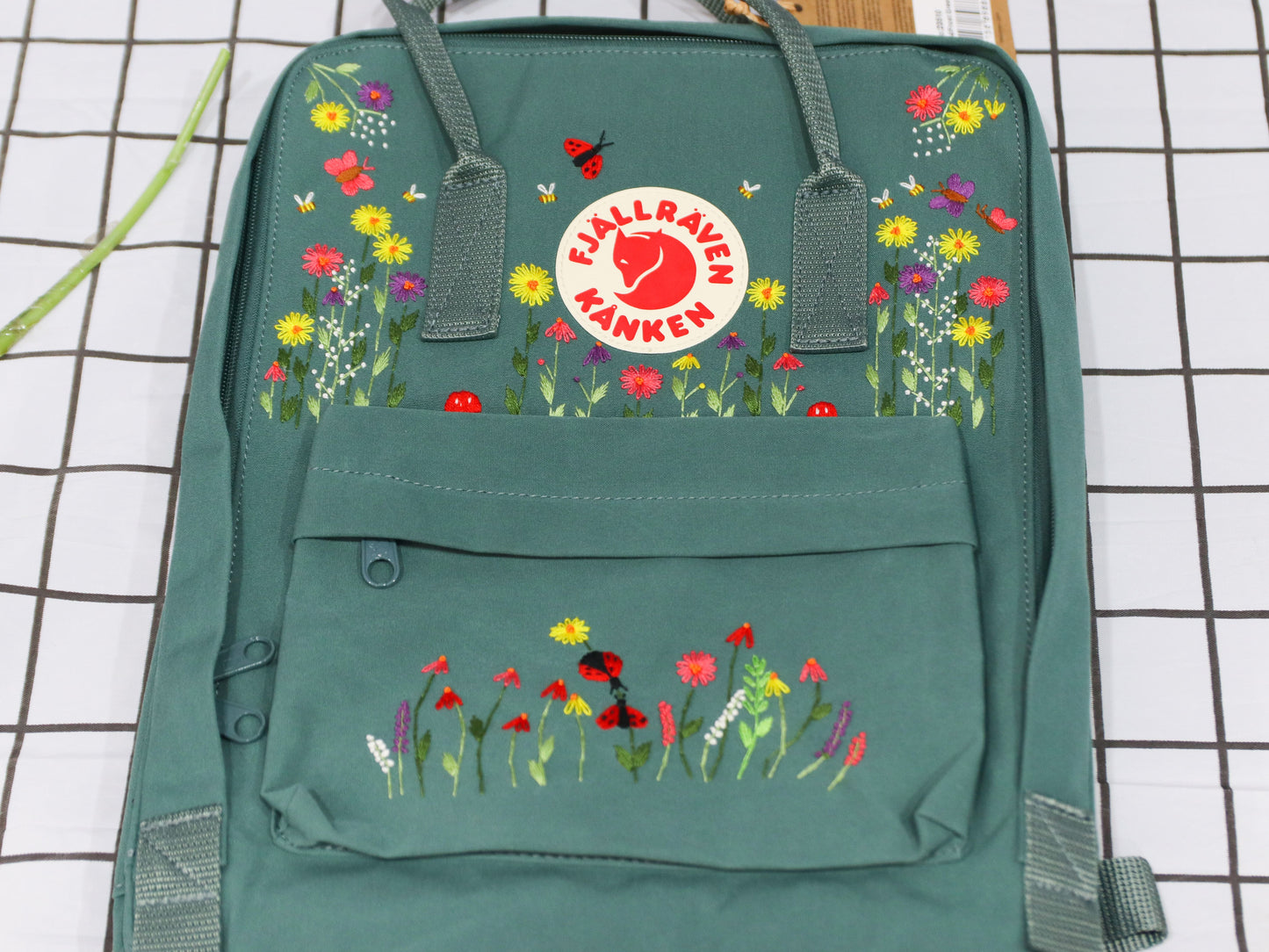 Fjallraven kanken backpack embroidered with ladybugs and colorful flowers