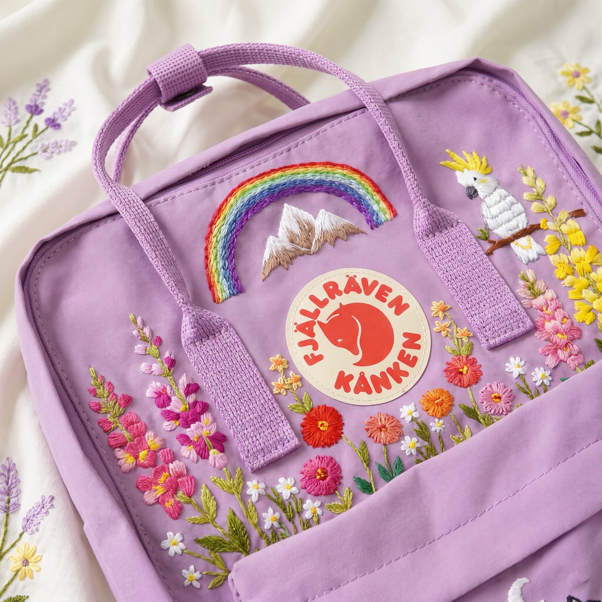 Hand Embroidered Fjallraven Kanken Wolf Backpack | Kanken Bag with Cockatoo, Snapdragon , Zinnia Flowers, Mountains & Rainbow | Custom Bag