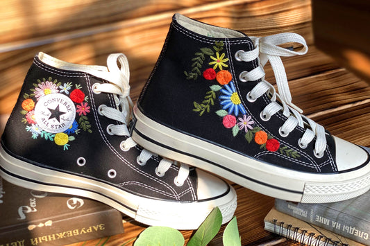 Converse High Tops shoes are embroidered with colorful flowers